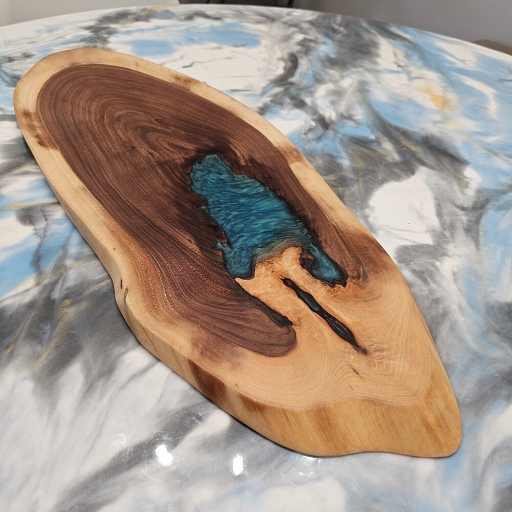 Black Walnut Live Edge Charcuterie Board with a hint of Pacific blue epoxy